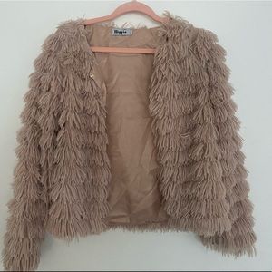 Pink, fur jacket with tiered layers. Never worn.